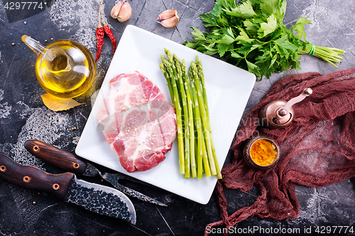 Image of meat with asparagus