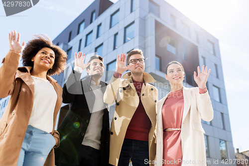 Image of international group of people on city street