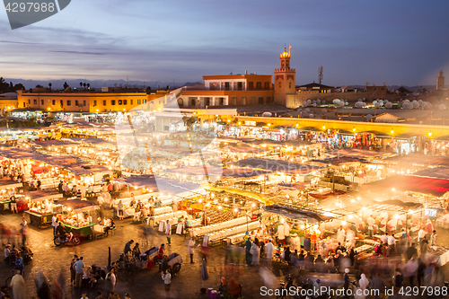 Image of Jamaa el Fna market square in sunset, Marrakesh, Morocco, north Africa.