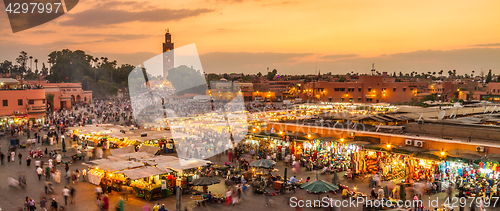 Image of Jamaa el Fna market square in sunset, Marrakesh, Morocco, north Africa.