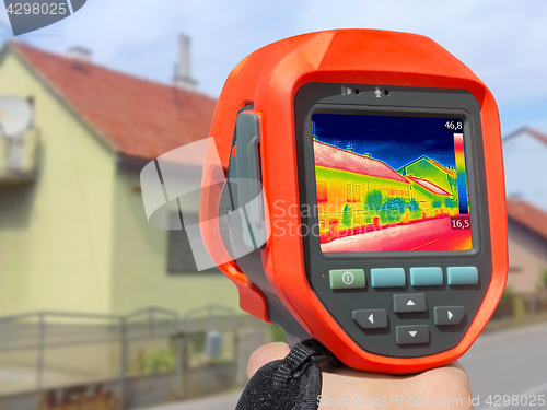 Image of Recording Heat Loss at the House With Infrared Thermal Camera