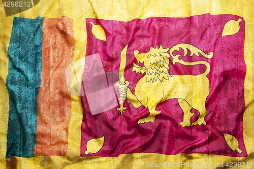 Image of Grunge style of Sri Lanka flag on brick wall