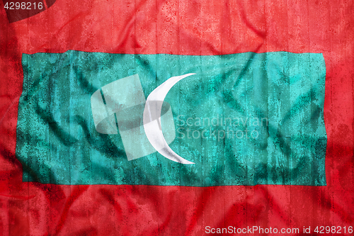 Image of Grunge style of Maldives flag on brick wall