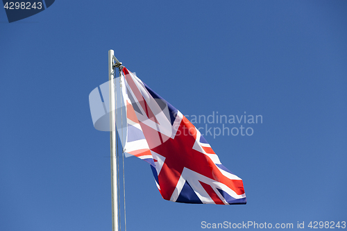 Image of UK flag on a flagpole