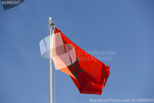 Image of National flag of Morocco on a flagpole