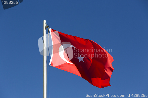 Image of National flag of Turkey on a flagpole