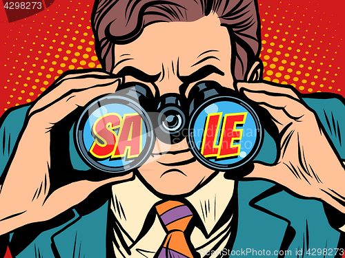 Image of Sale Businessman looking through binoculars