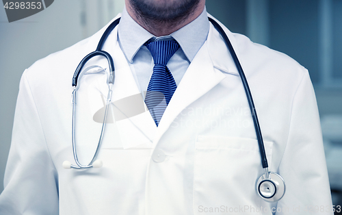 Image of close up of doctor with stethoscope at hospital