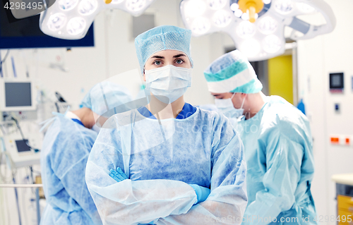 Image of surgeon in operating room at hospital