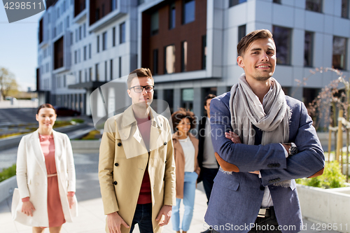 Image of international group of people on city street