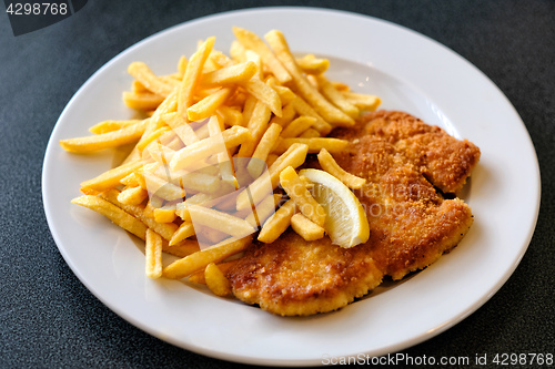 Image of Wiener Schnitzel with fried potatoes