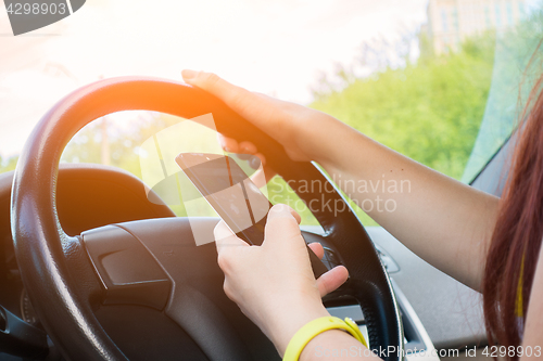 Image of Photo of woman with phone