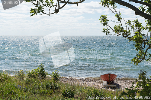 Image of Rowing boat by seaside