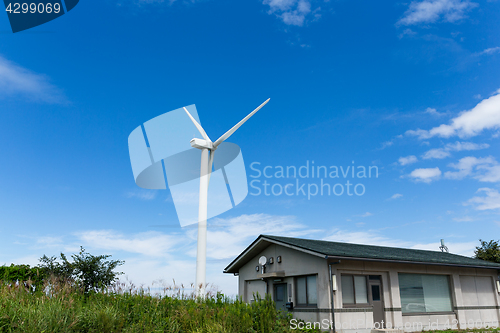 Image of Wind turbine and blue sky