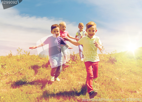 Image of group of happy kids running outdoors