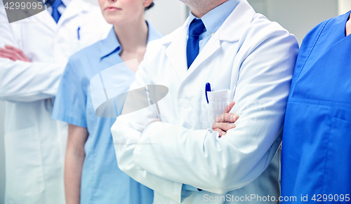 Image of close up of medics or doctors at hospital corridor