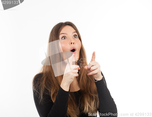 Image of Beautiful young woman showing blank signboard