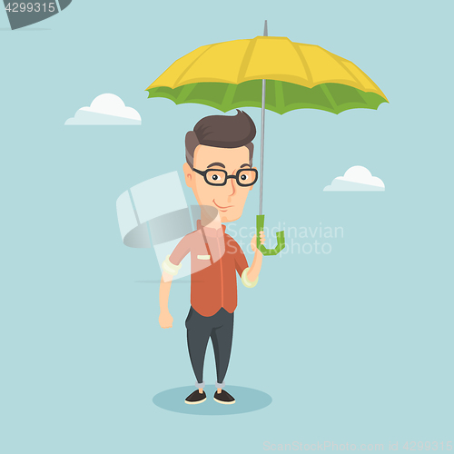 Image of Business man insurance agent with umbrella.