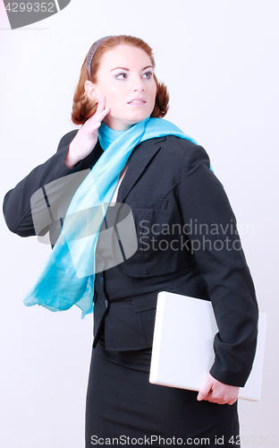 Image of Businesswoman with laptop and Oversize