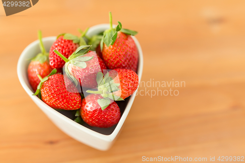 Image of Fresh Strawberry in heart shape bowl