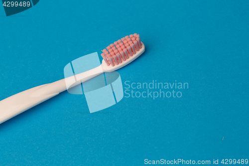 Image of Image of one pink toothbrush