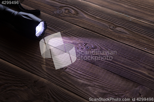 Image of Wooden texture with flashlight on