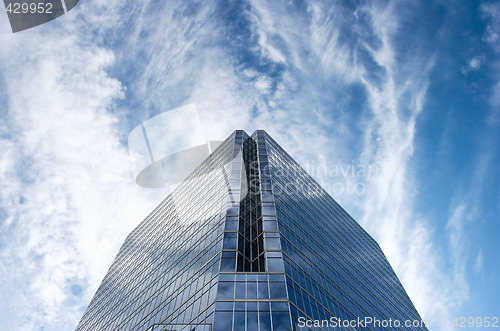 Image of Glass Office Building In Huge Blue Sky