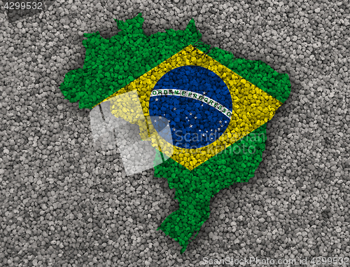 Image of Map and flag of Brazil on poppy seeds