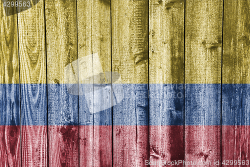 Image of Flag of Colombia on weathered wood