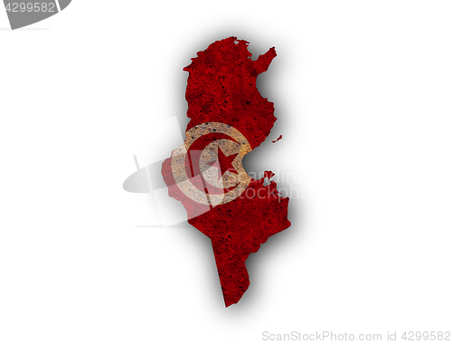 Image of Map and flag of Tunisia on rusty metal