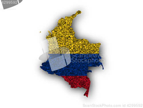 Image of Map and flag of Colombia on poppy seeds
