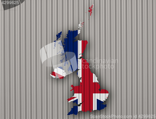 Image of Map and flag of Great Britain on corrugated iron,