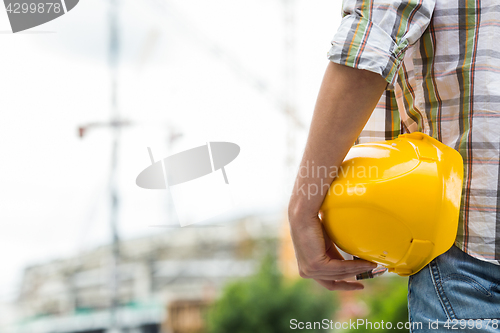 Image of Image of builder with helmet