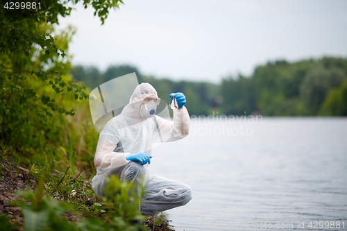 Image of Laboratory assistant with bulb, summer