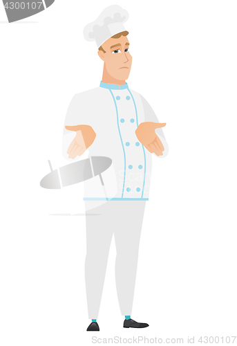 Image of Caucasian confused chef cook shrugging shoulders