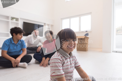 Image of portrait of happy young boys with their dad