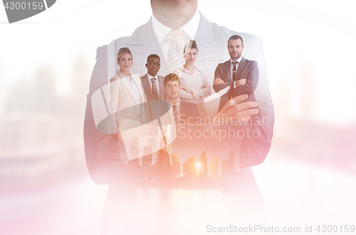 Image of Double exposure of young ambitious business group