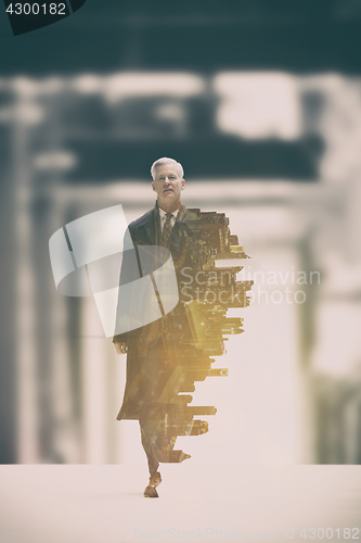 Image of Double exposure of senior businessman