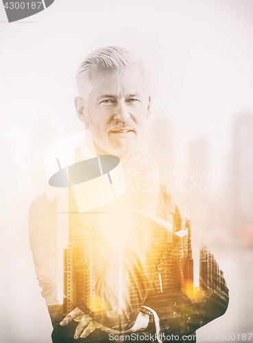 Image of Double exposure of senior businessman