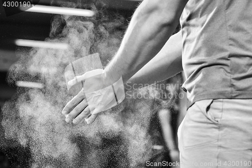 Image of Gym Chalk Magnesium Carbonate hands clapping man