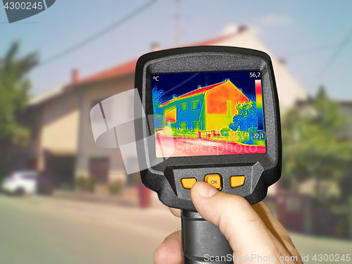 Image of Recording Heat Loss at the House With Infrared Thermal Camera