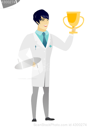 Image of Asian doctor holding a golden trophy.