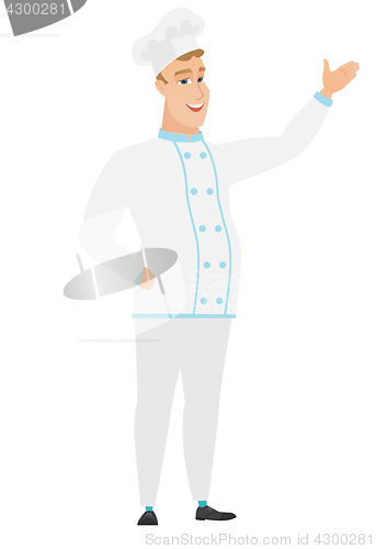 Image of Caucasian chef cook showing a direction.