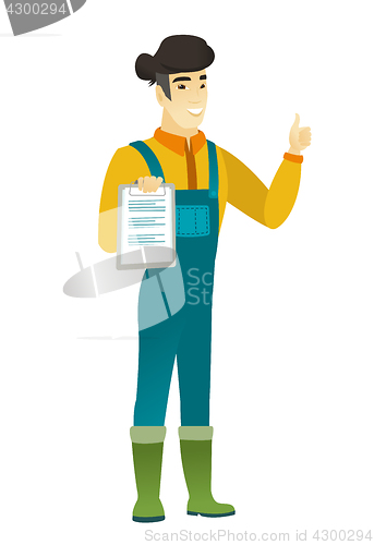 Image of Farmer with clipboard giving thumb up.