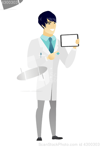 Image of Smiling doctor holding tablet computer.