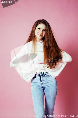 Image of cute pretty redhair teenage girl smiling cheerful on pink background, lifestyle modern people concept