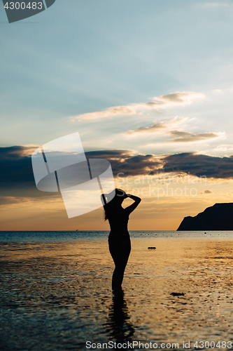 Image of Female silhouette in water