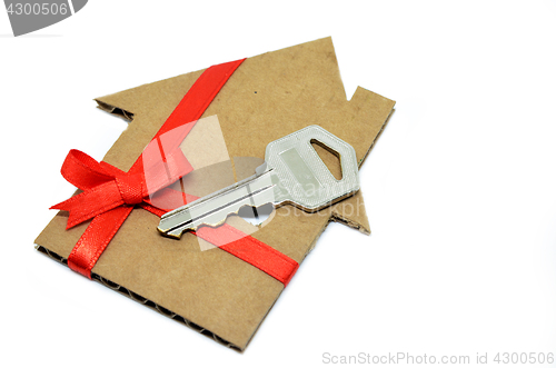 Image of House from cardboard with ribbon