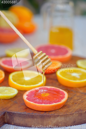 Image of Grapefruit, clementine, orange and honey