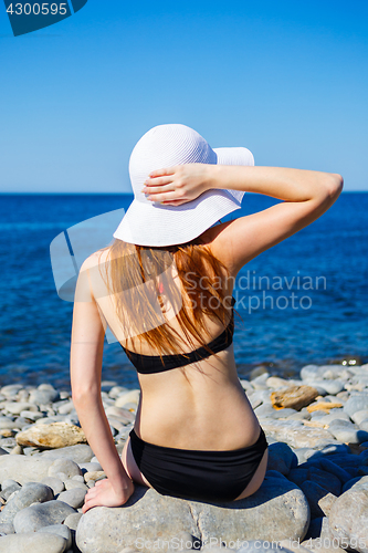 Image of Anonymous woman in bikini on beach
